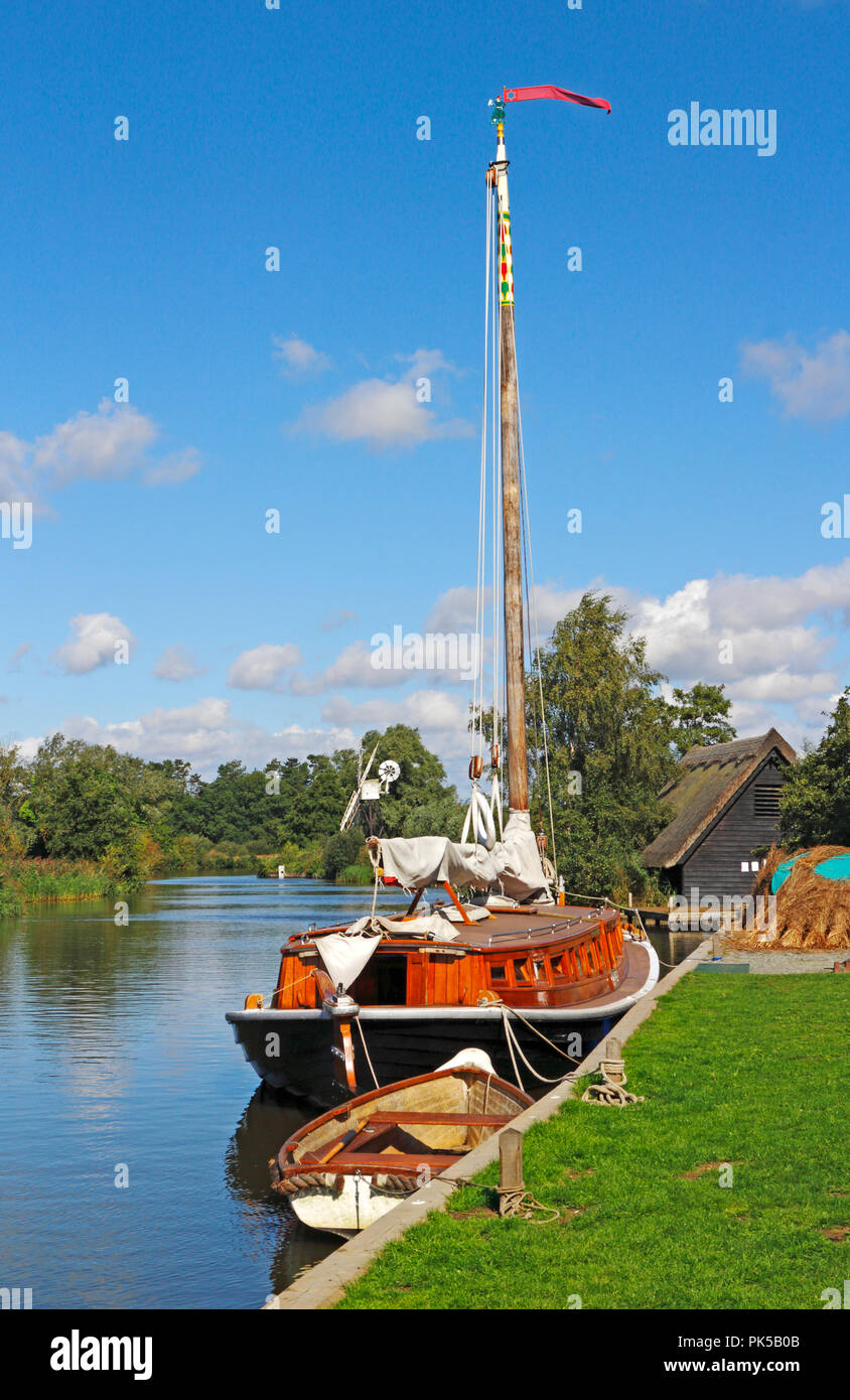 A view of the Norfolk Pleasure Wherry Hathor moored on the River Ant by How Hill, Ludham, Norfolk, England, United Kingdom, Europe. Stock Photo