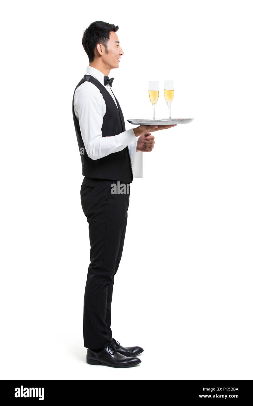 Young waiter with champagne Stock Photo