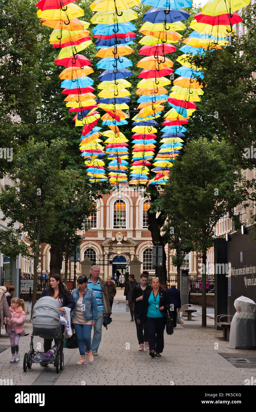 Two hundred colourful umbrellas in Church Alley Liverpool to raise