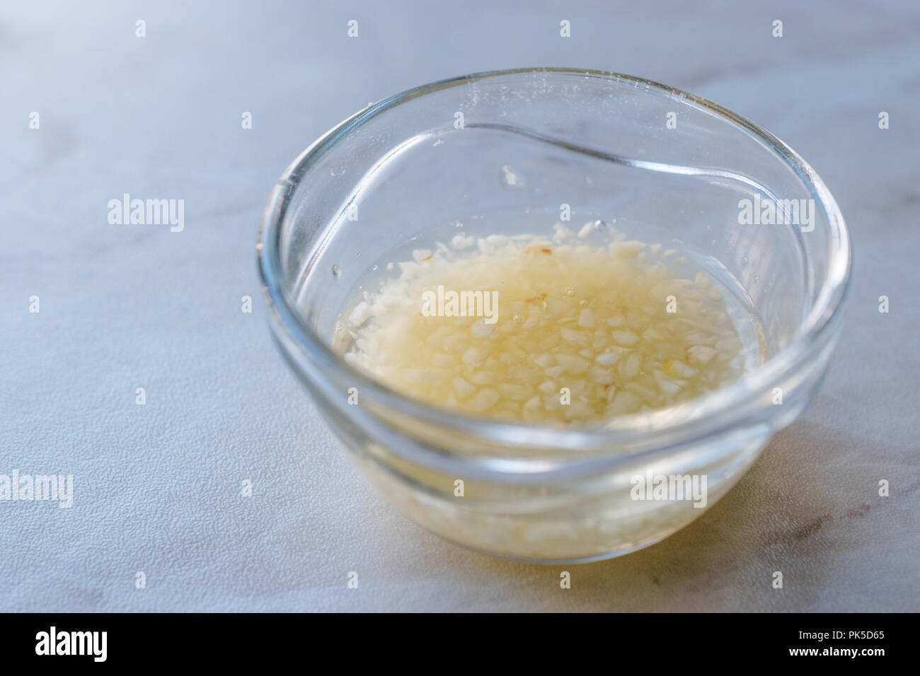 Turkish Style Chopped Garlic Sauce for Soups in Glass Cup. Traditional Organic Food Stock Photo