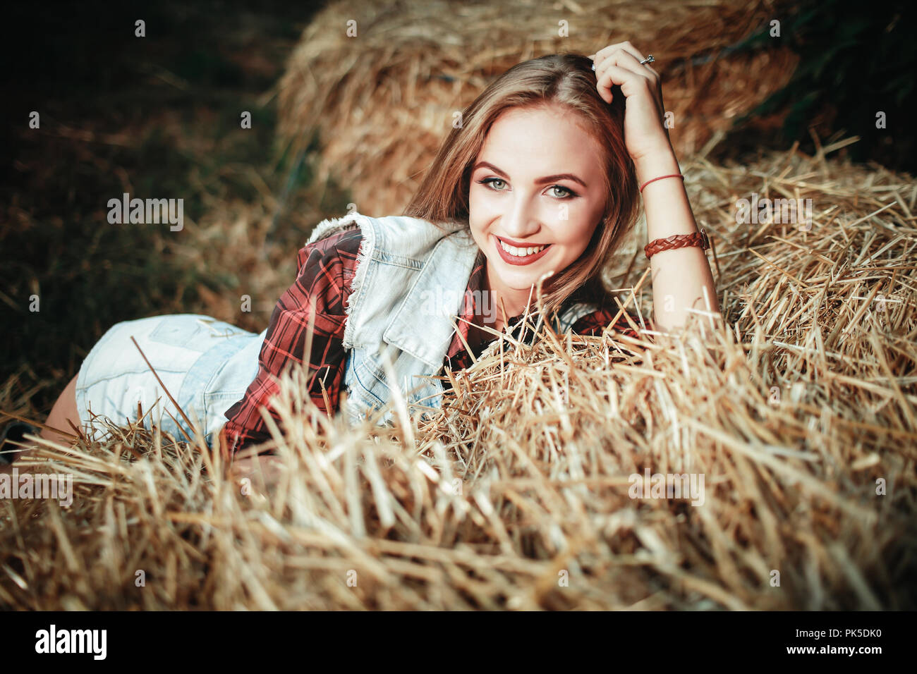 Beautiful woman in a field hi-res stock photography and images - Alamy