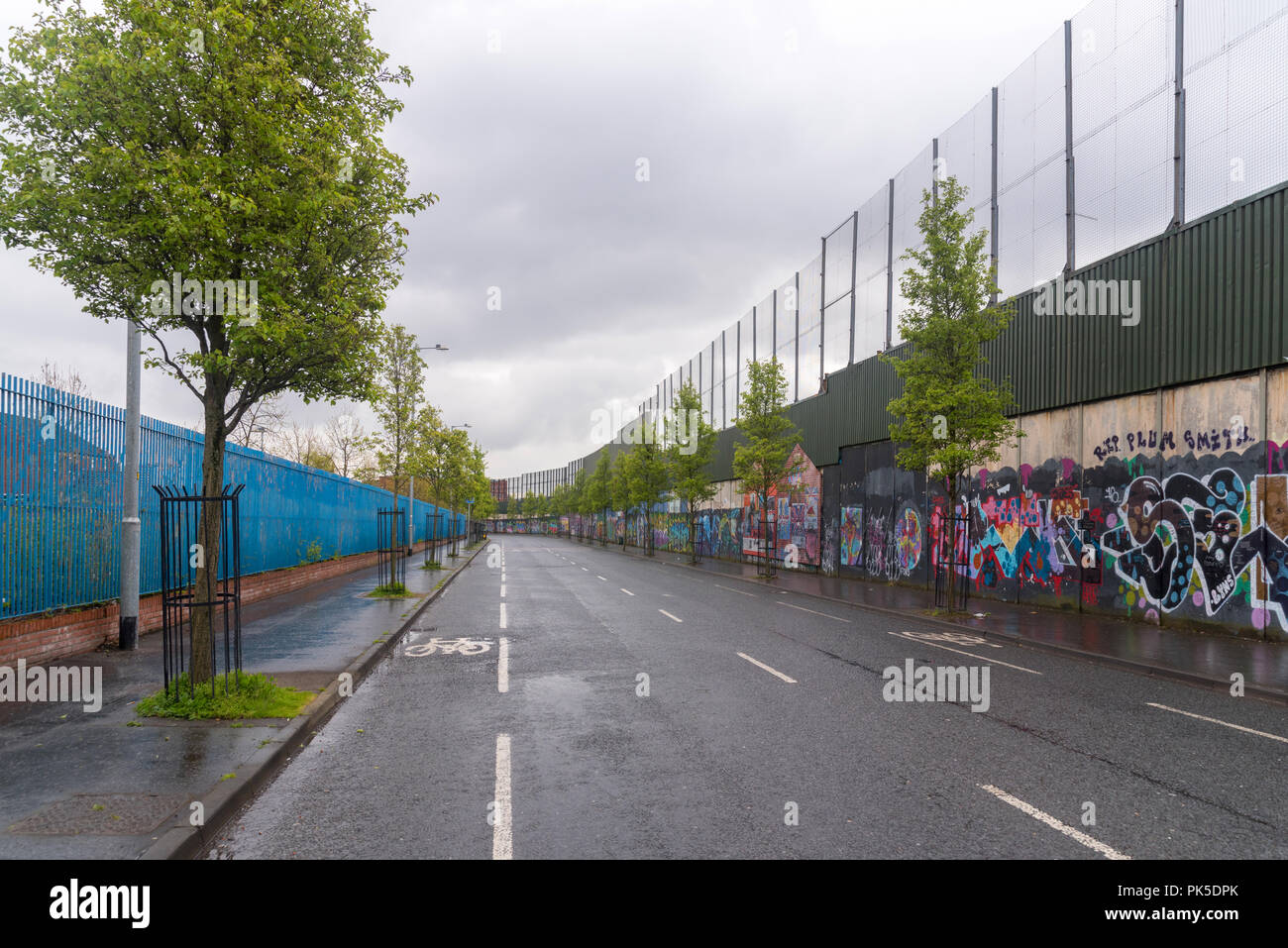 The Peace wall in West Belfast, Northern Ireland Stock Photo