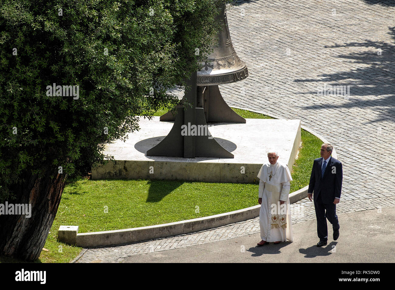 Benedict XVI meet George W.Bush  Vatican City, Vatican Gardens 13 06 2008.Sua Holiness' Pope Benedict XVI received in audience with U.S. President George W. Bush, for the first time in the unique setting of the Tower of St. John in the Vatican Gardens. pictured from left: the Pres Bush, the Holy Father, before the copy of the Lourdes Grotto. Stock Photo