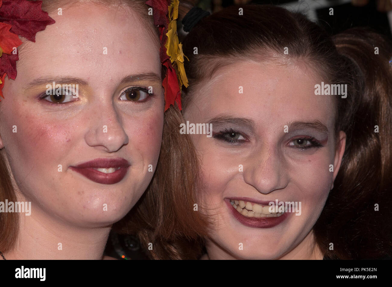 Two teen girls in makeup and costume Stock Photo