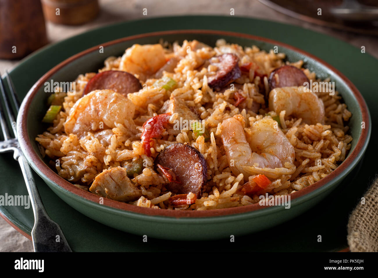 A bowl of delicious cajun style jambalaya with shrimp, chicken and sausage. Stock Photo