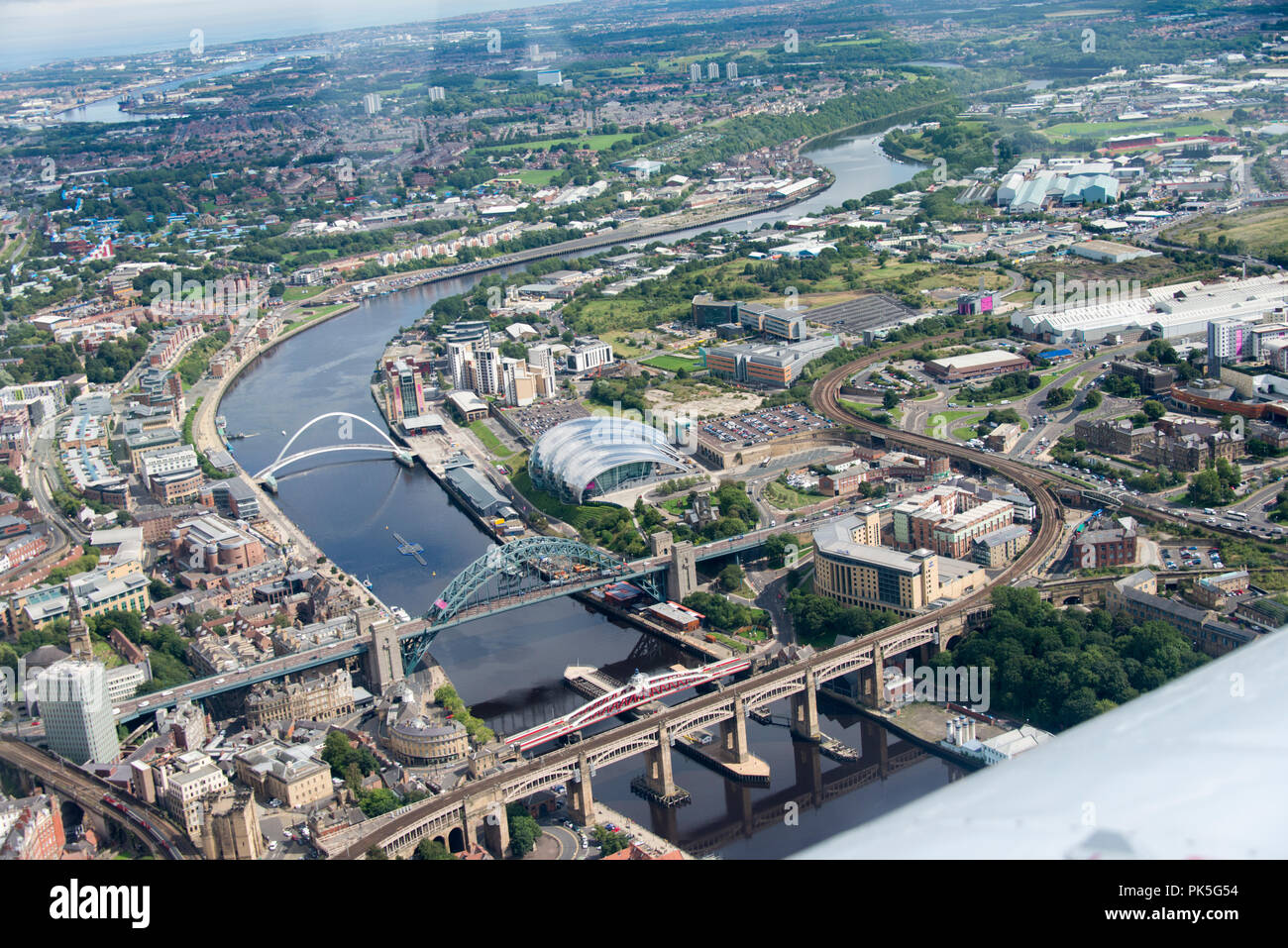 Ariel photograph taken from light aircraft of the River Tyne, the High Level, Tyne, Swing and Millenium Bridges between Gateshead and Newcastle. Stock Photo