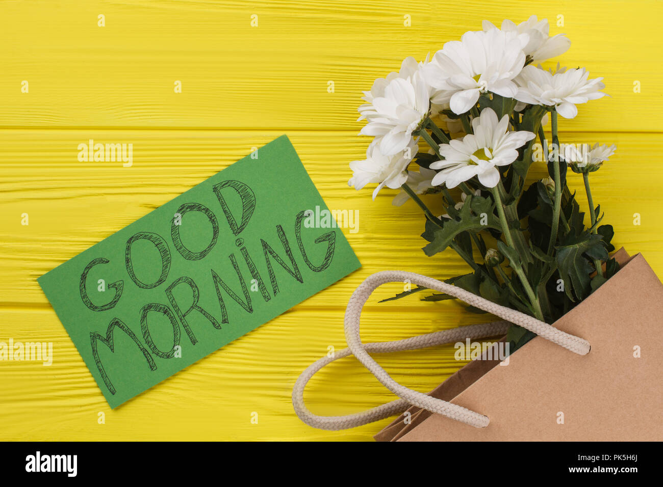 Bouquet Of Chamomile Flowers And Good Morning Wish Yellow Wooden