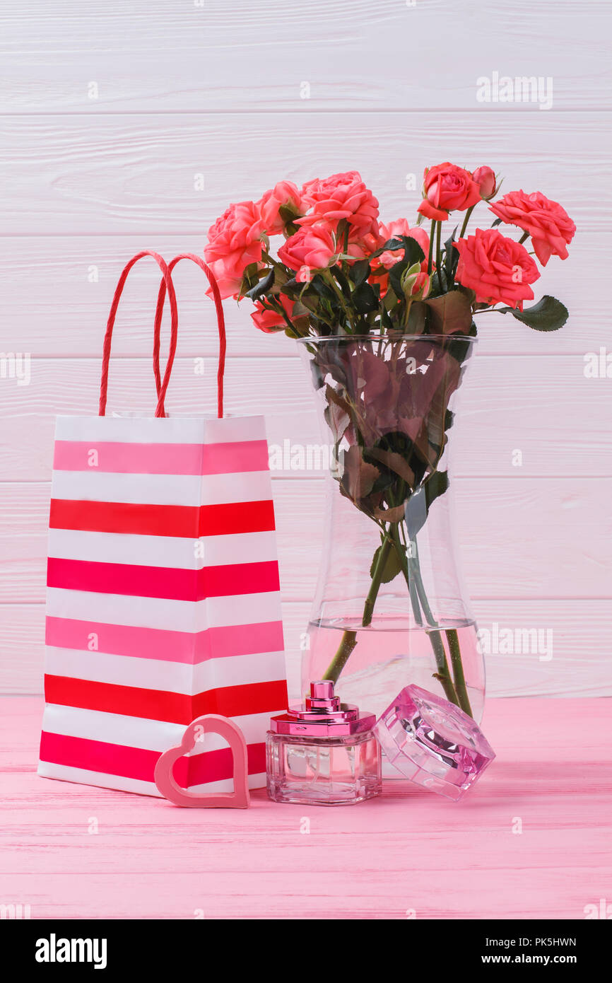 colorful flower bouquet in paper gift bag Stock Photo - Alamy