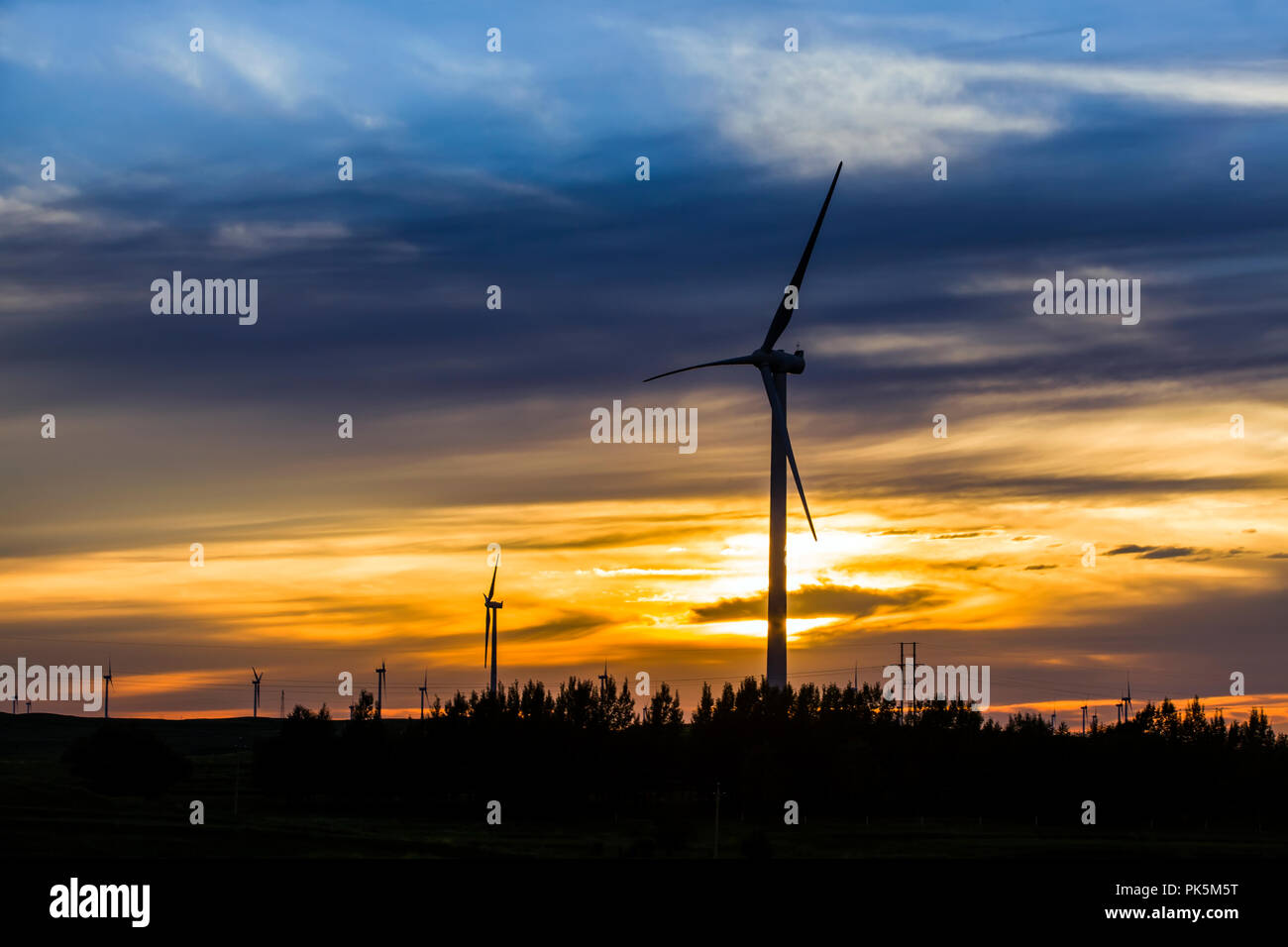 In the evening, the silhouette of wind turbines Stock Photo - Alamy