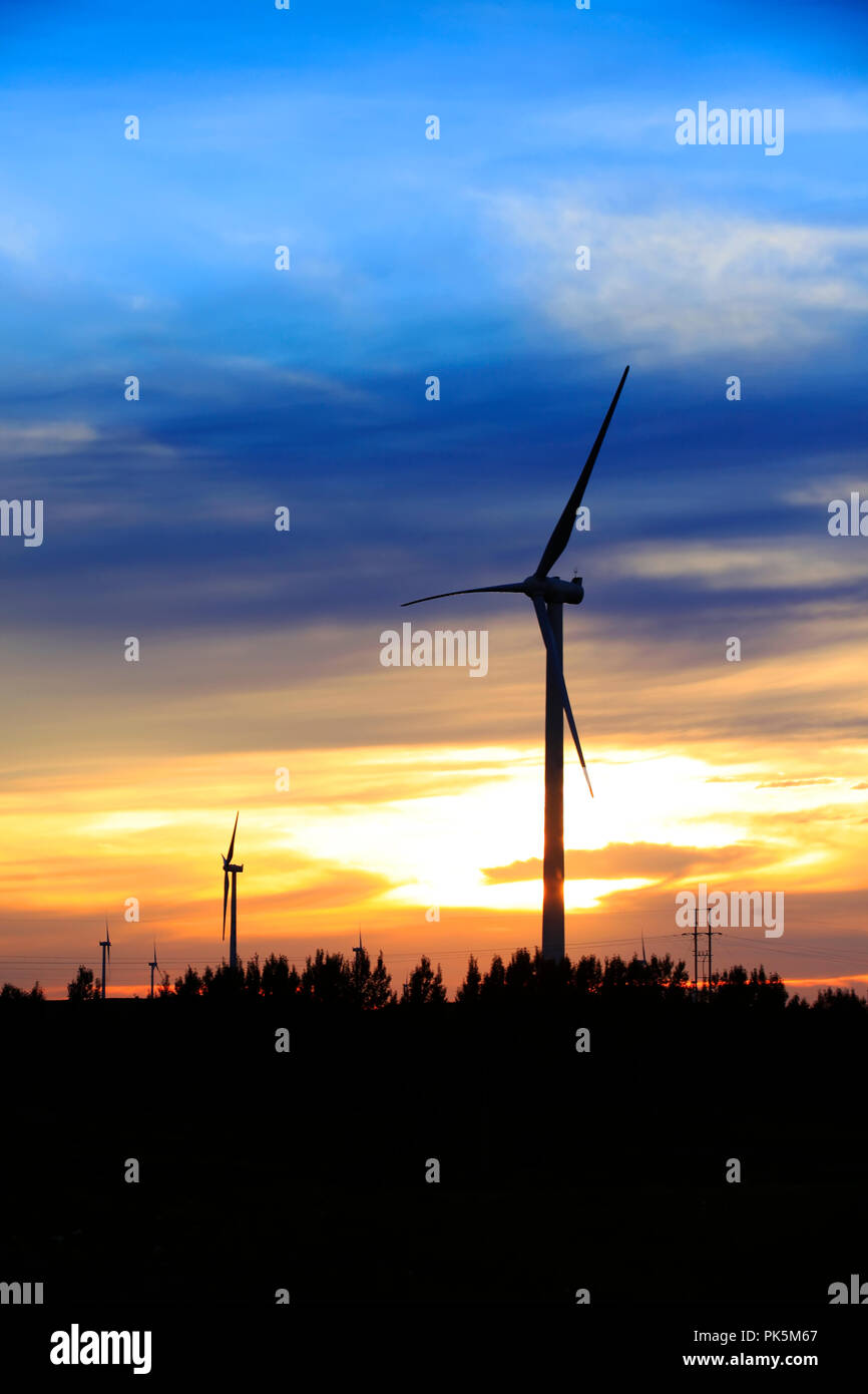 In the evening, the silhouette of wind turbines Stock Photo - Alamy