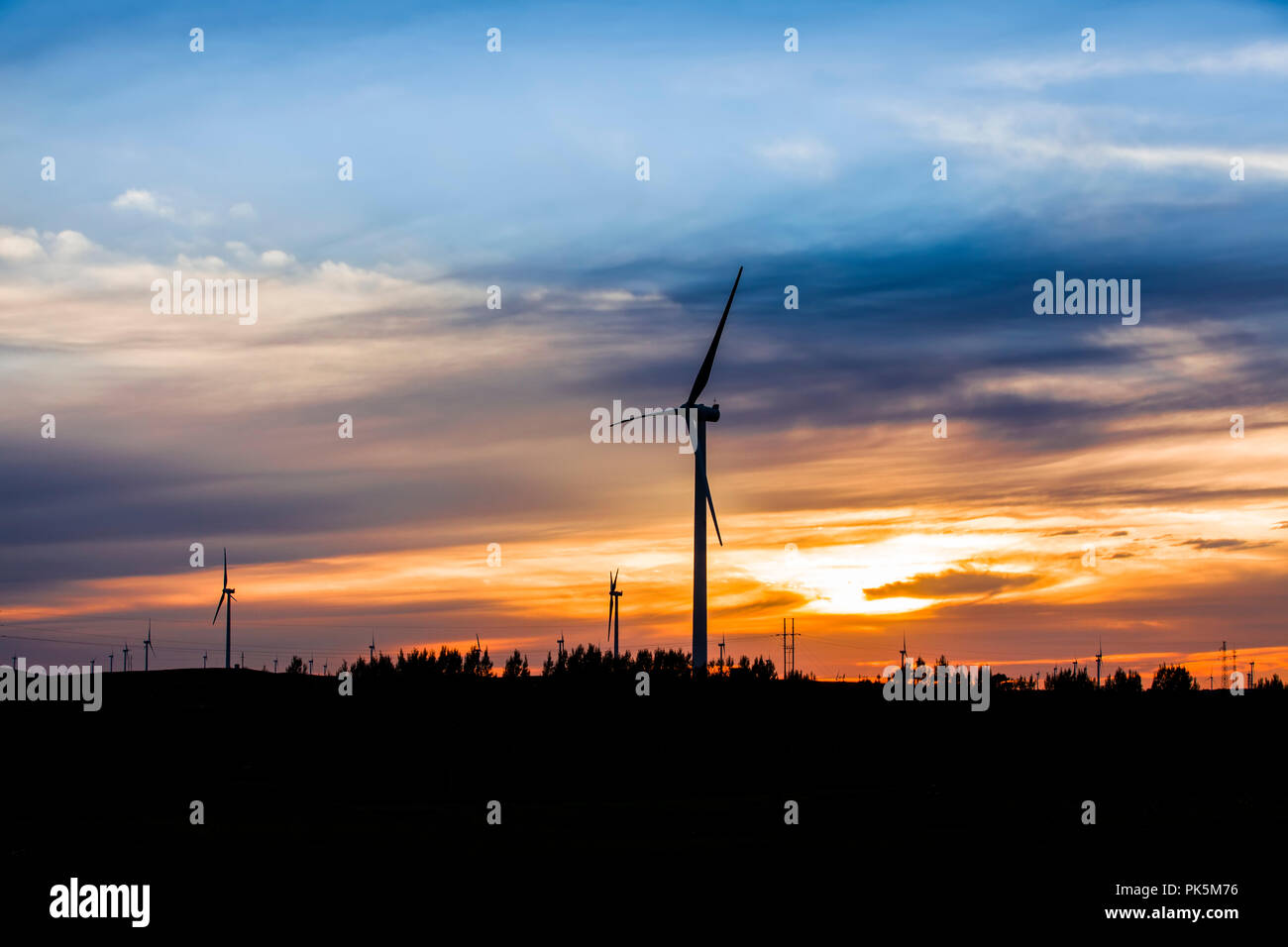 In the evening, the silhouette of wind turbines Stock Photo - Alamy