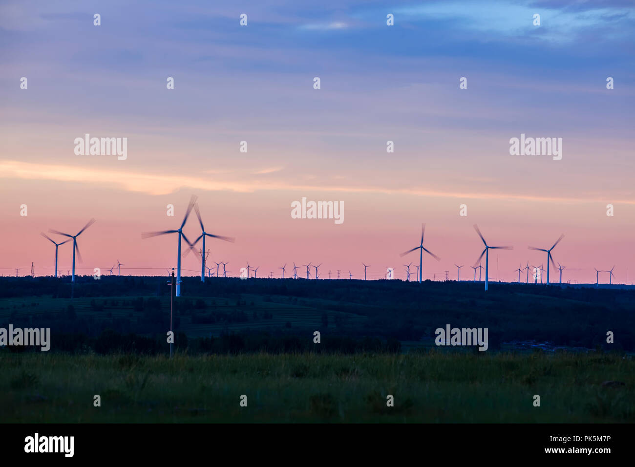 In the evening, the silhouette of wind turbines Stock Photo - Alamy
