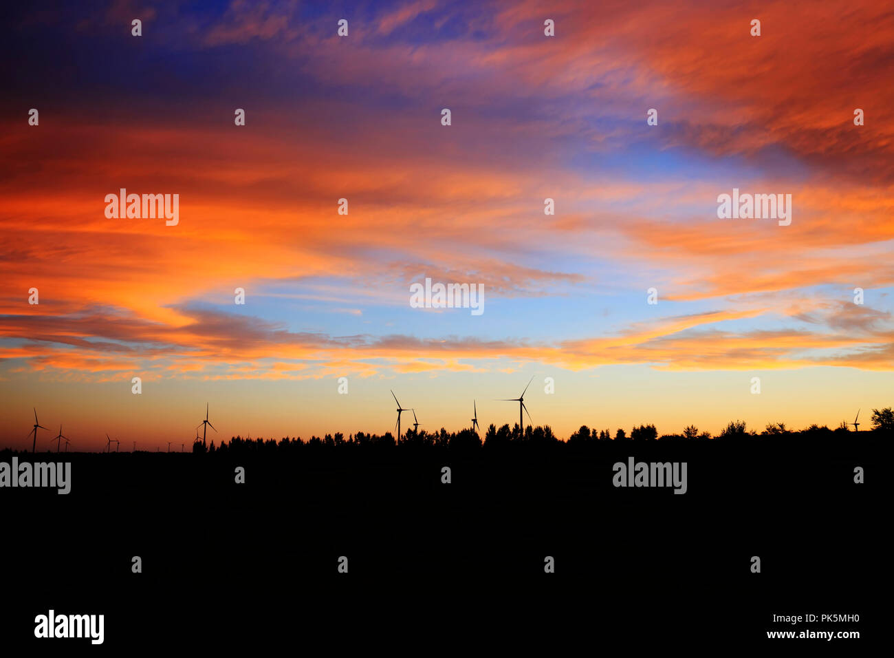 In the evening, the silhouette of wind turbines Stock Photo - Alamy