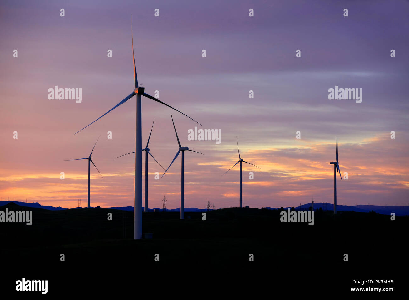 In the evening, the silhouette of wind turbines Stock Photo - Alamy