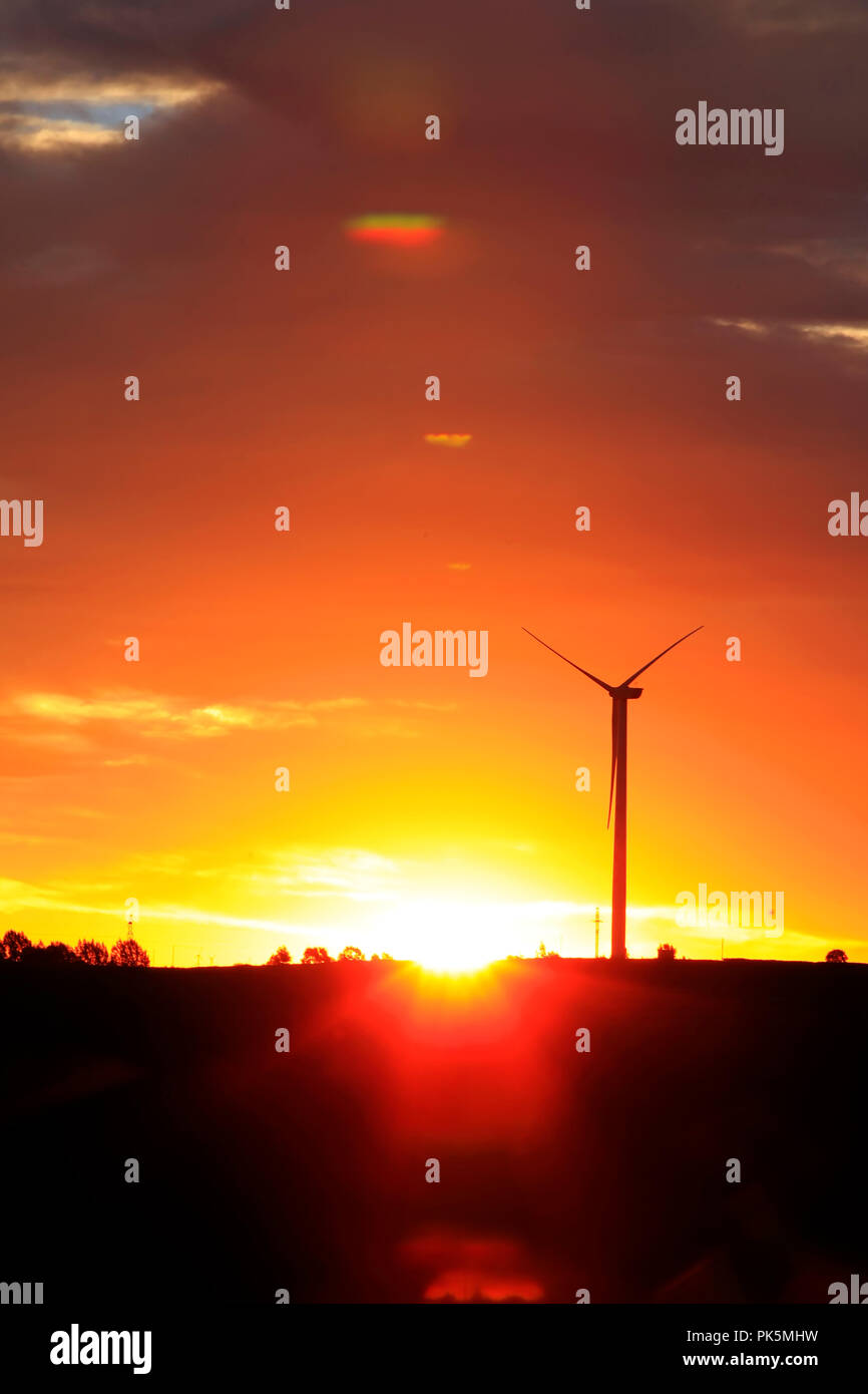 In the evening, the silhouette of wind turbines Stock Photo - Alamy