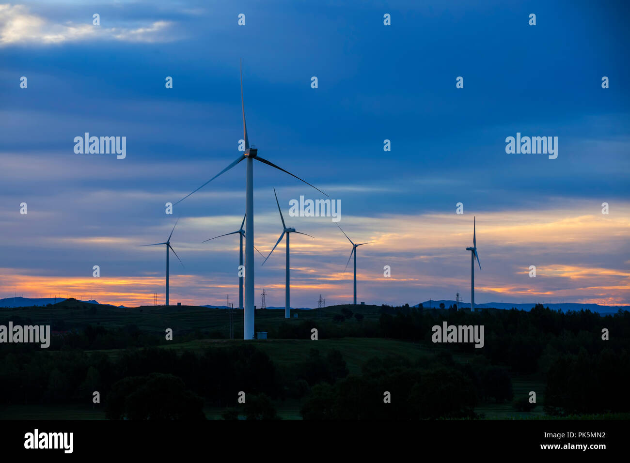In the evening, the silhouette of wind turbines Stock Photo - Alamy