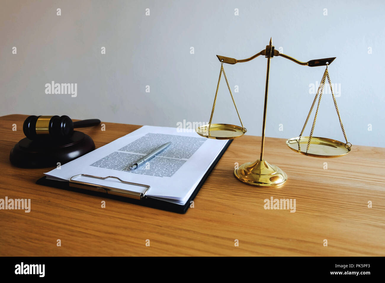 Close up object  law concept. Judge gavel with justice lawyers and documents working on table. Stock Photo