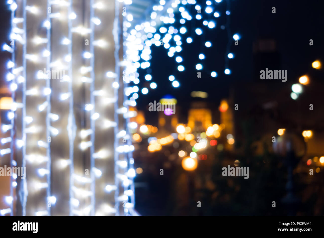 Blurred bokeh light background. Night city lights blur. Retro toned photo,  vintage Stock Photo - Alamy
