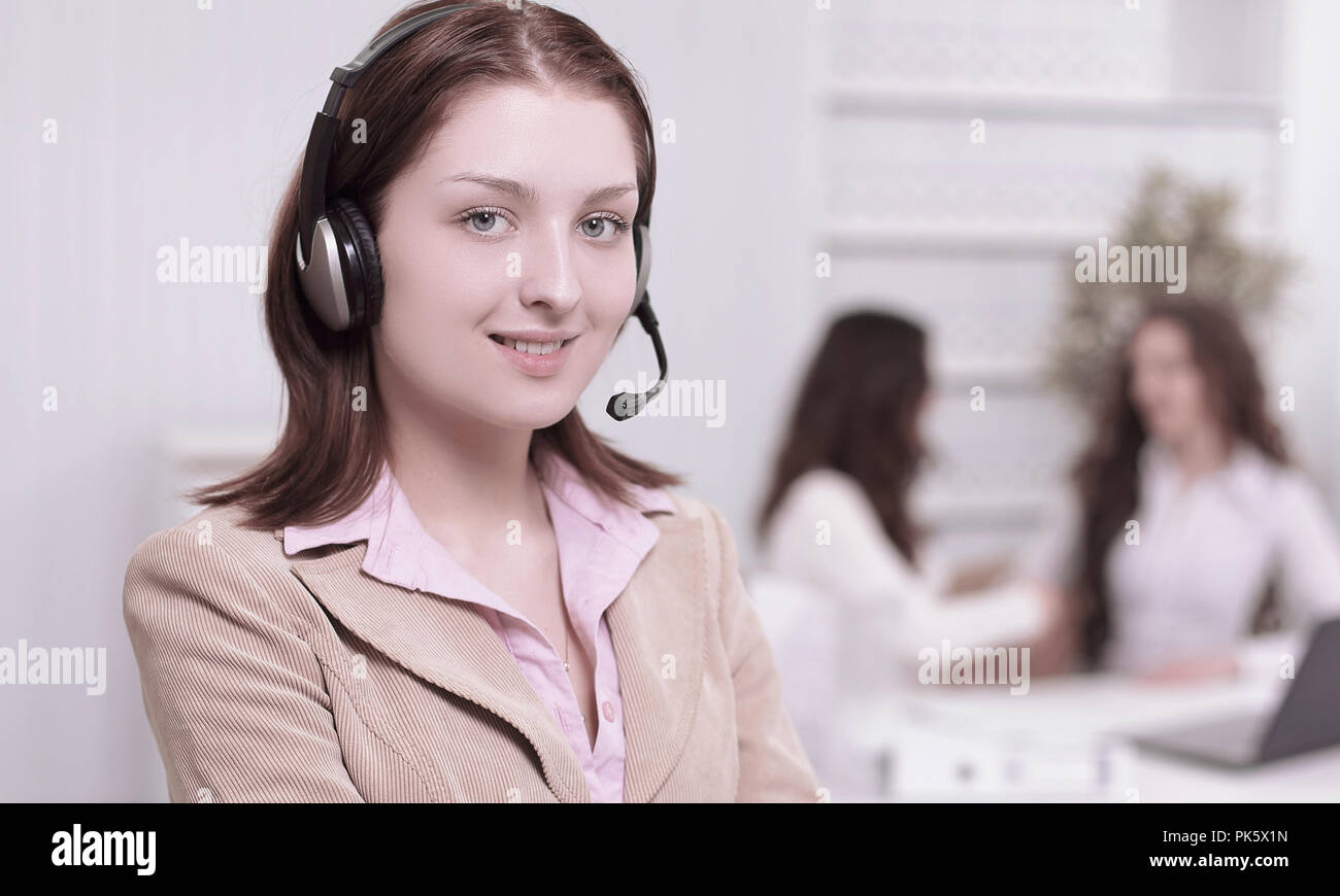 ortrait of a young employee call center in the background of th Stock Photo