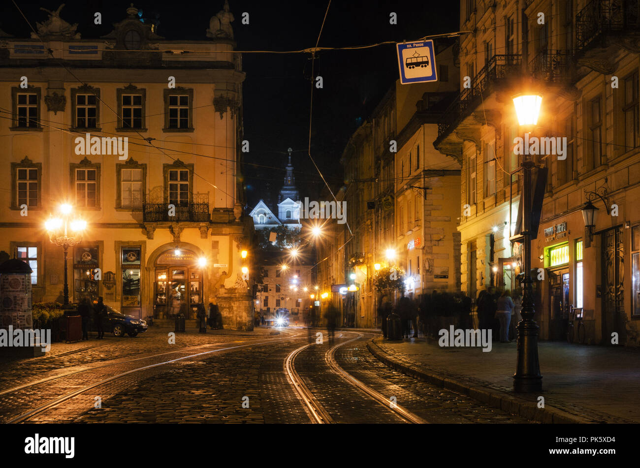 Lviv, Ukraine - September 22, 2016: Scenic view of illuminated street of Old Town at night, Lviv, Ukraine. Stock Photo