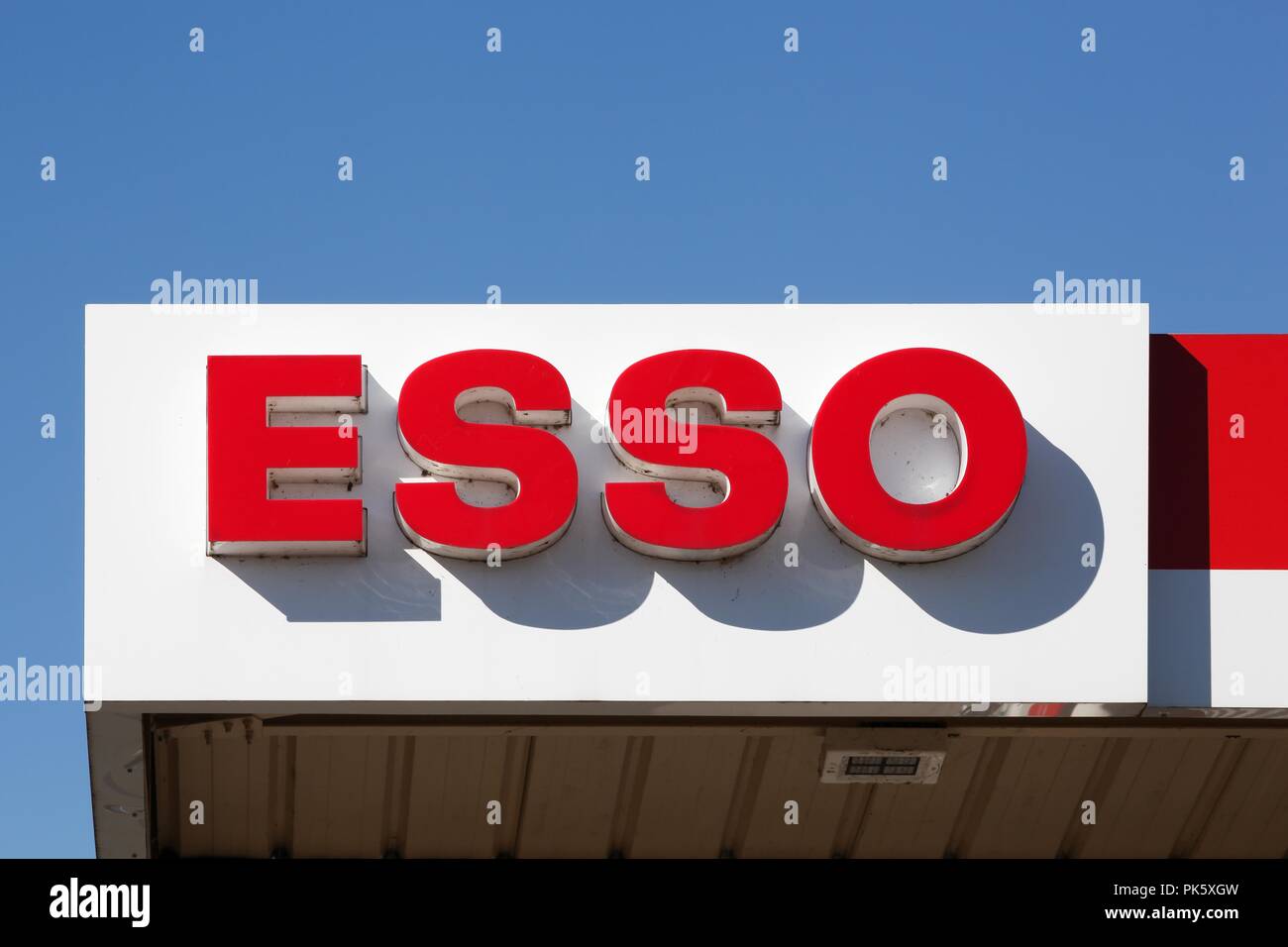 Mionnay, France - September 8, 2018: Esso logo on a gas station. Esso is an international trade name for ExxonMobil Stock Photo