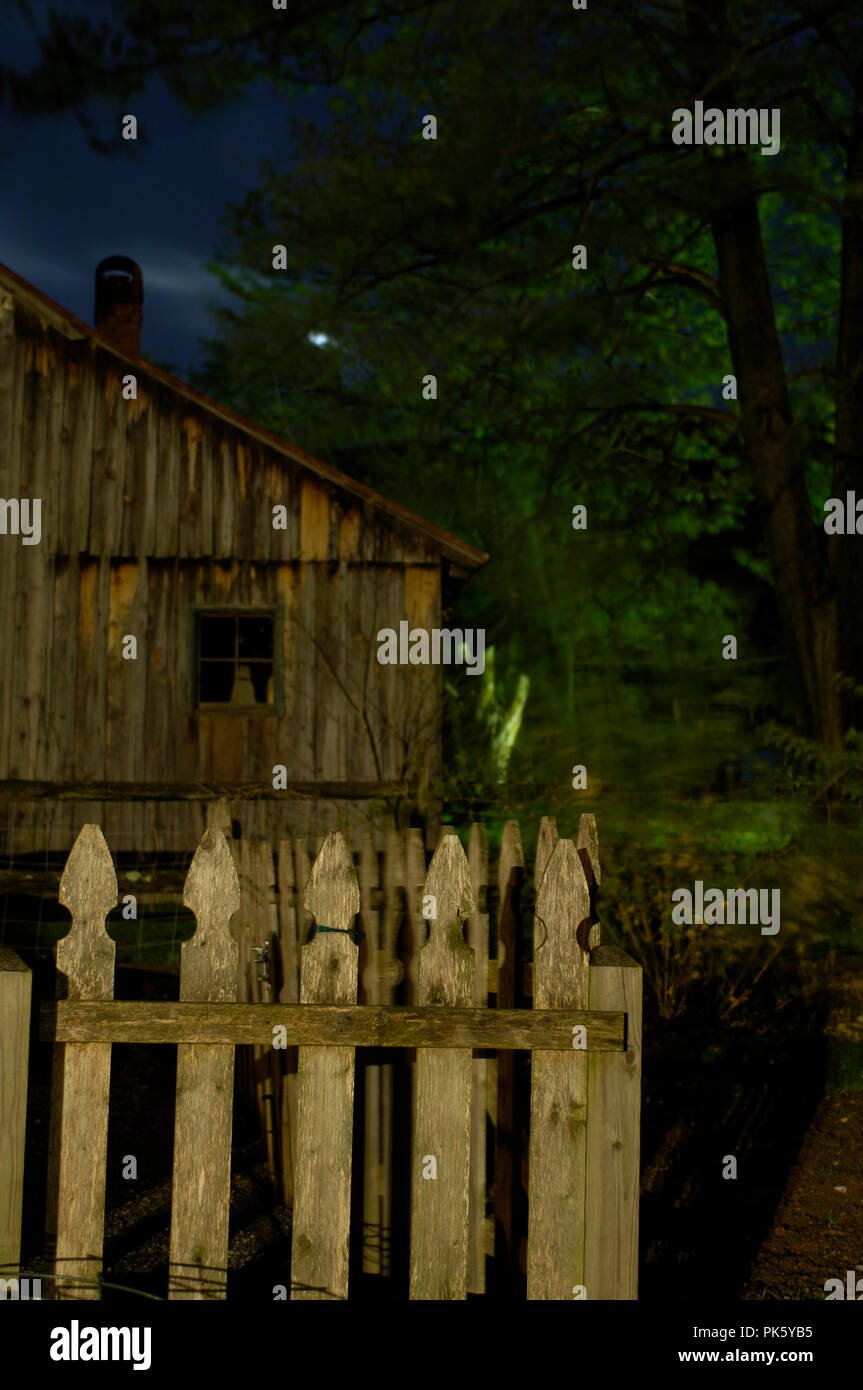 Moon Rise Over A Log Cabin In Pine Grove Virginia Stock Photo