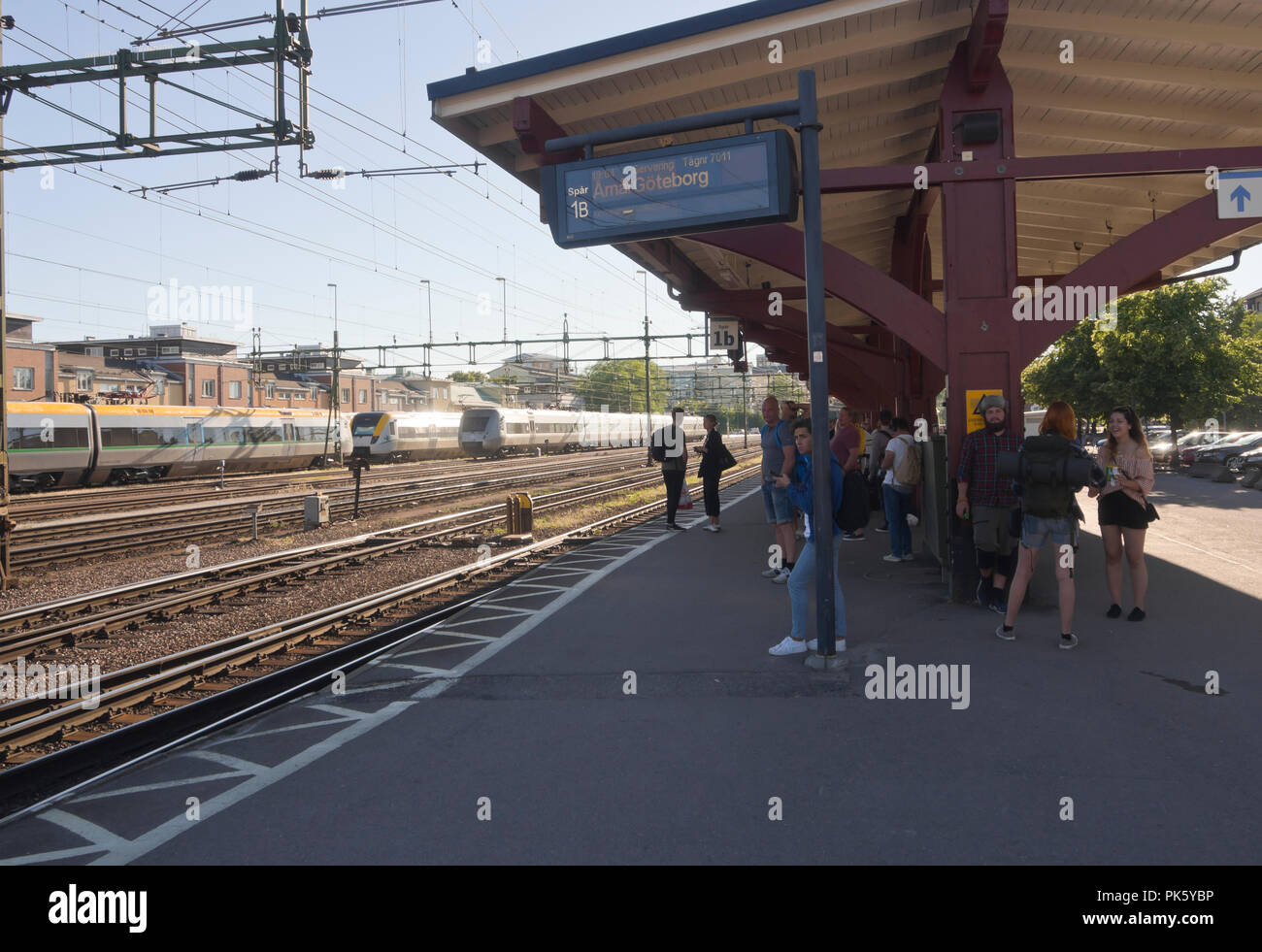 Platform and waiting passengers at the railway station in Karlstad