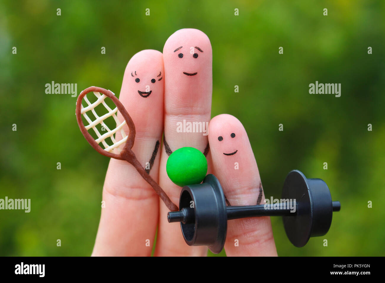 Fingers art of a Happy family in sports Stock Photo Alamy