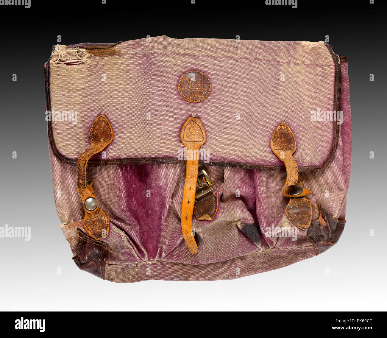 A well worn, faded, and used Leica camera bag from the 1970s. Stock Photo