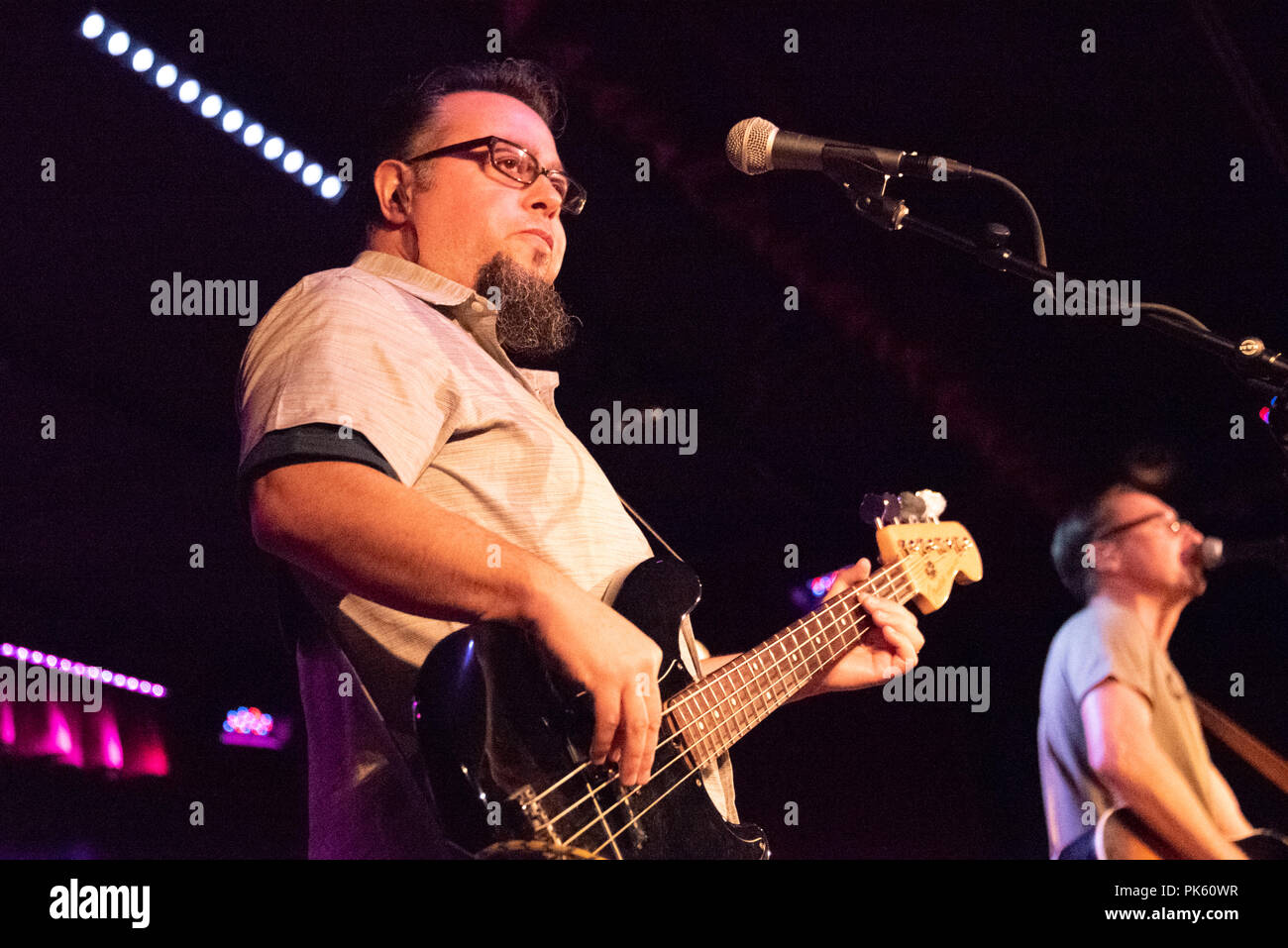 Miguel DeJesus (bassist) and Michael Johnston (lead singer) of Smalltown Poets performing live at the City Winery in Atlanta, Georgia. (USA) Stock Photo
