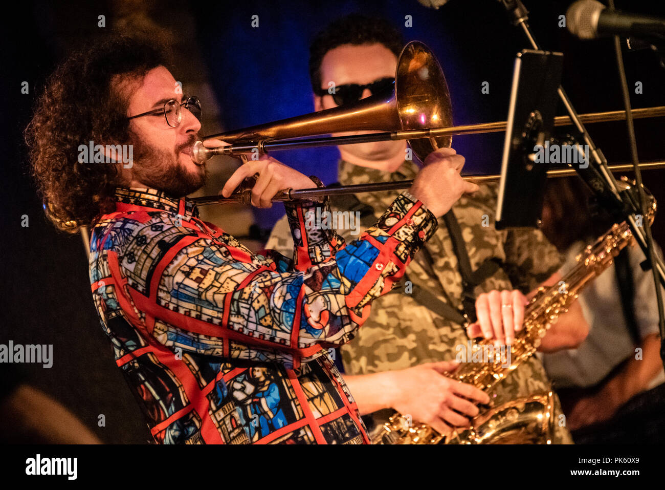 Memphis musician Freedman Steorts steps in to join Smalltown Poets with his masterful trombone skills during a live concert at City Winery Atlanta. Stock Photo