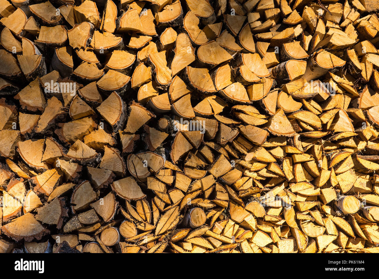 Stack of chopped firewood logs in a pile Stock Photo - Alamy