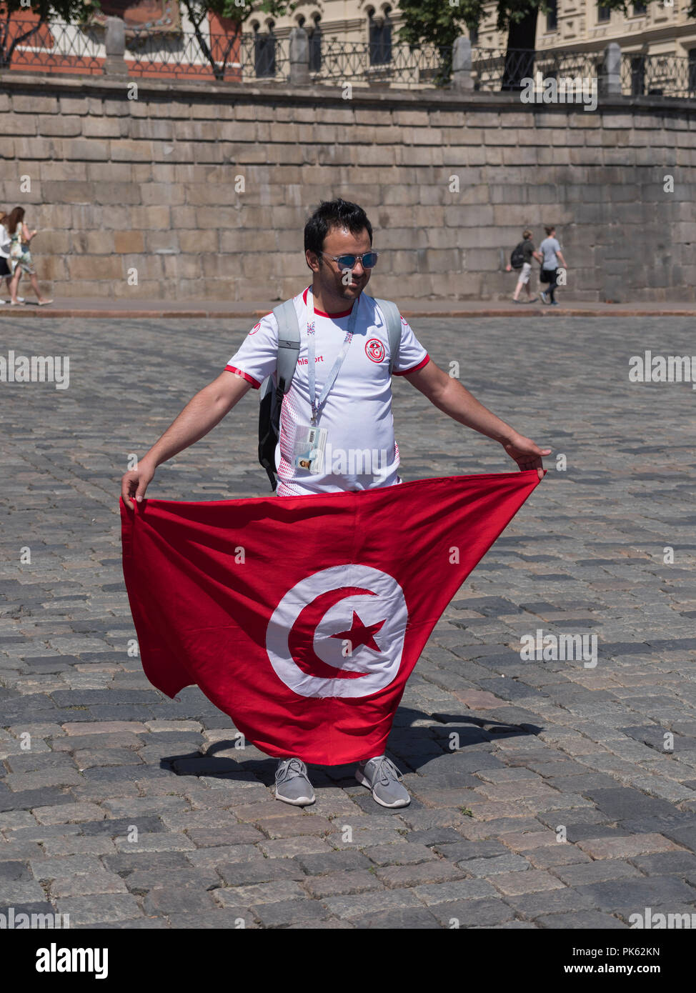 MOSCOW - JUNE 20, 2018: Soccer World Cup Fanatics of Tunisia with flags with their typical costumes in the streets June 20, 2018 in Moscow, Russia Stock Photo