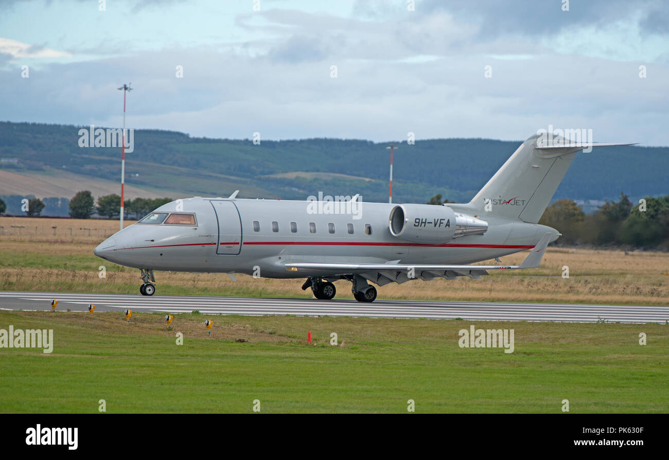 Maltese registered Canadair Challenger 605 Vistajet 9H-VFA arriving at Inverness Dalcross airport. Stock Photo