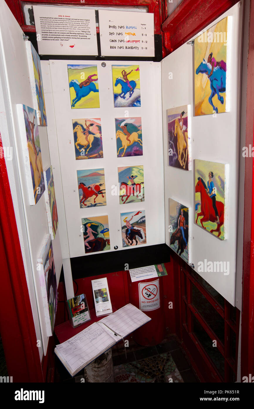 UK, Yorkshire, Settle, Green Head Lane, the Gallery on the Green, in old red K6 phone box, world’s smallest art gallery, dales and dames exhibition by Stock Photo