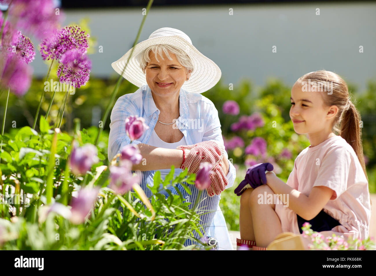 Beautiful mature woman summer gardening hi-res stock photography and ...