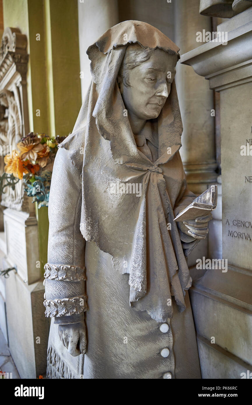 Picture and image of the realistic stone sculpture of a women praying at the monumental tomb of Luigi Priario by sculptor Paernio 1880,  the Staglieno Stock Photo