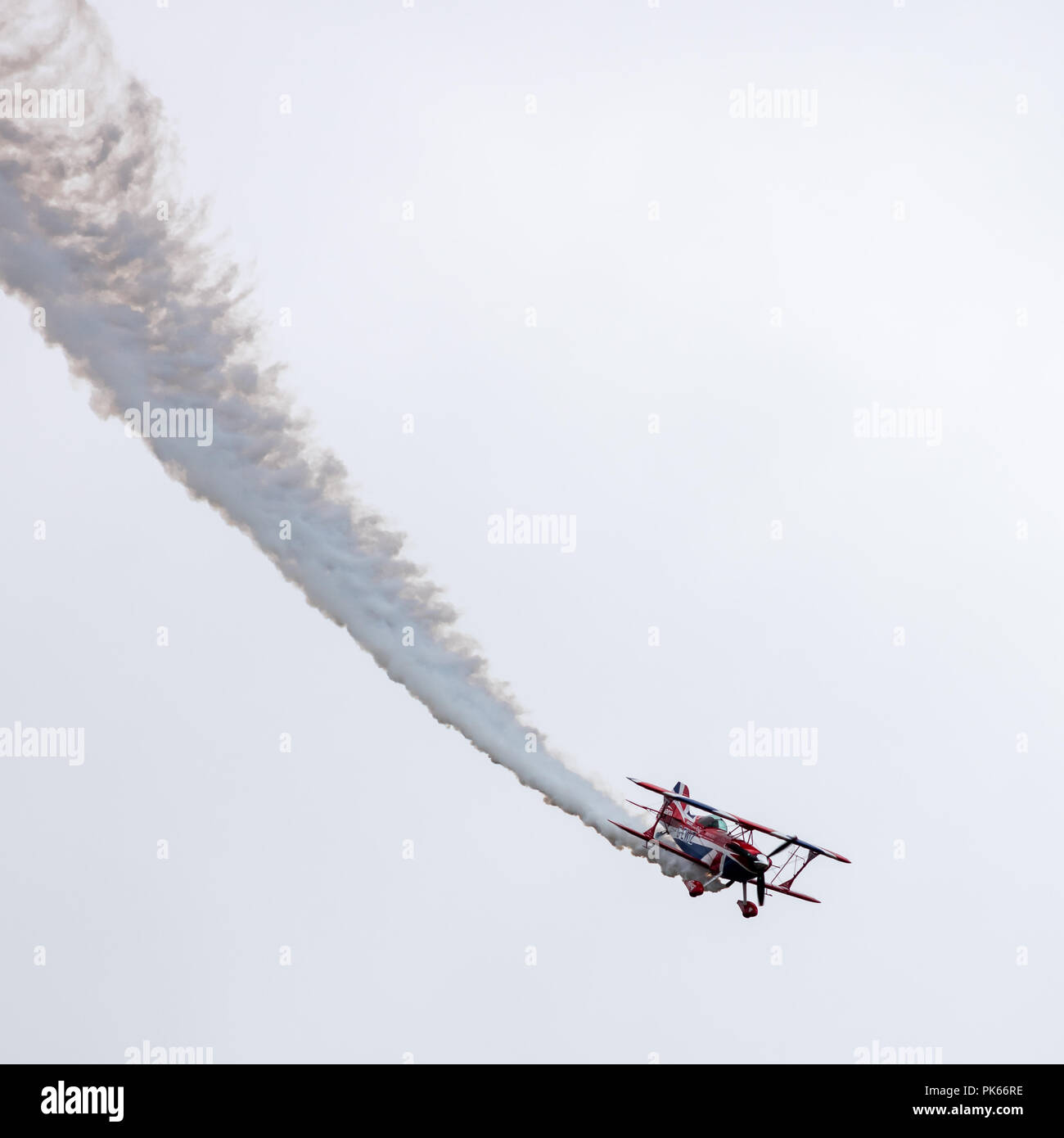 A Pitts Special S2S Biplane with a 8.5 ltre Lycoming 540 engine performing an aerobatics routine Stock Photo