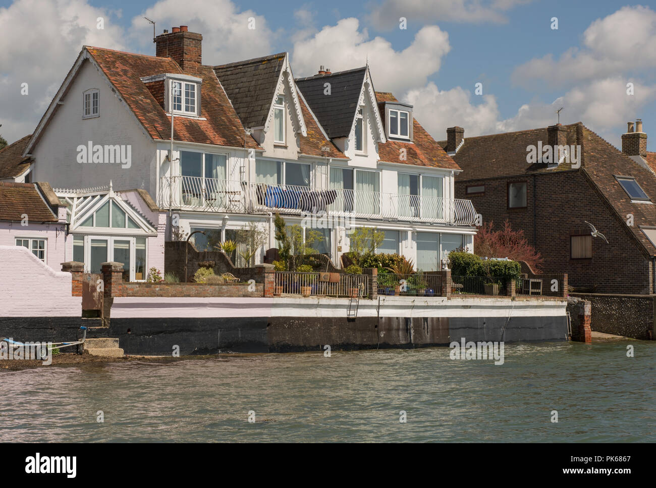Houses with balconies on the seafront at Emsworth in Hampshire, England