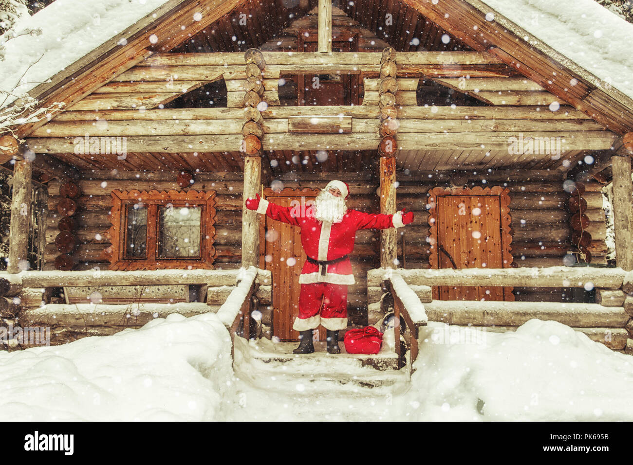 Joyful Santa Claus in his house. The home of Santa Claus at the