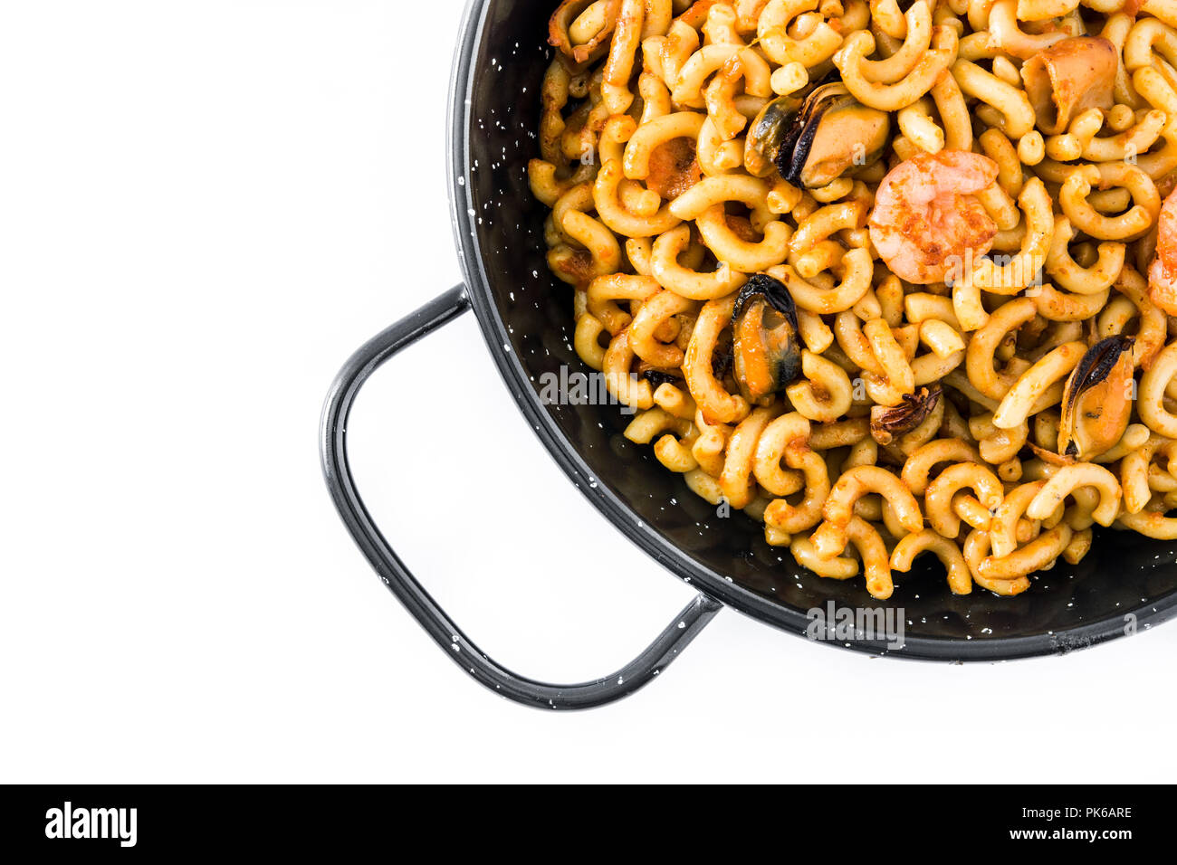 Traditional Spanish fideua. Noodle paella isolated on white background. Top  view Stock Photo - Alamy