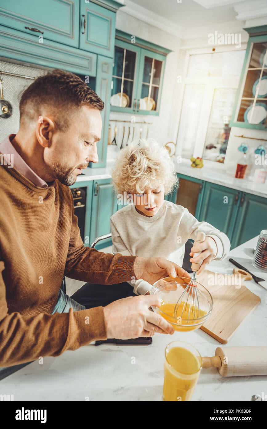 Whisk in a large kitchen Stock Photo - Alamy