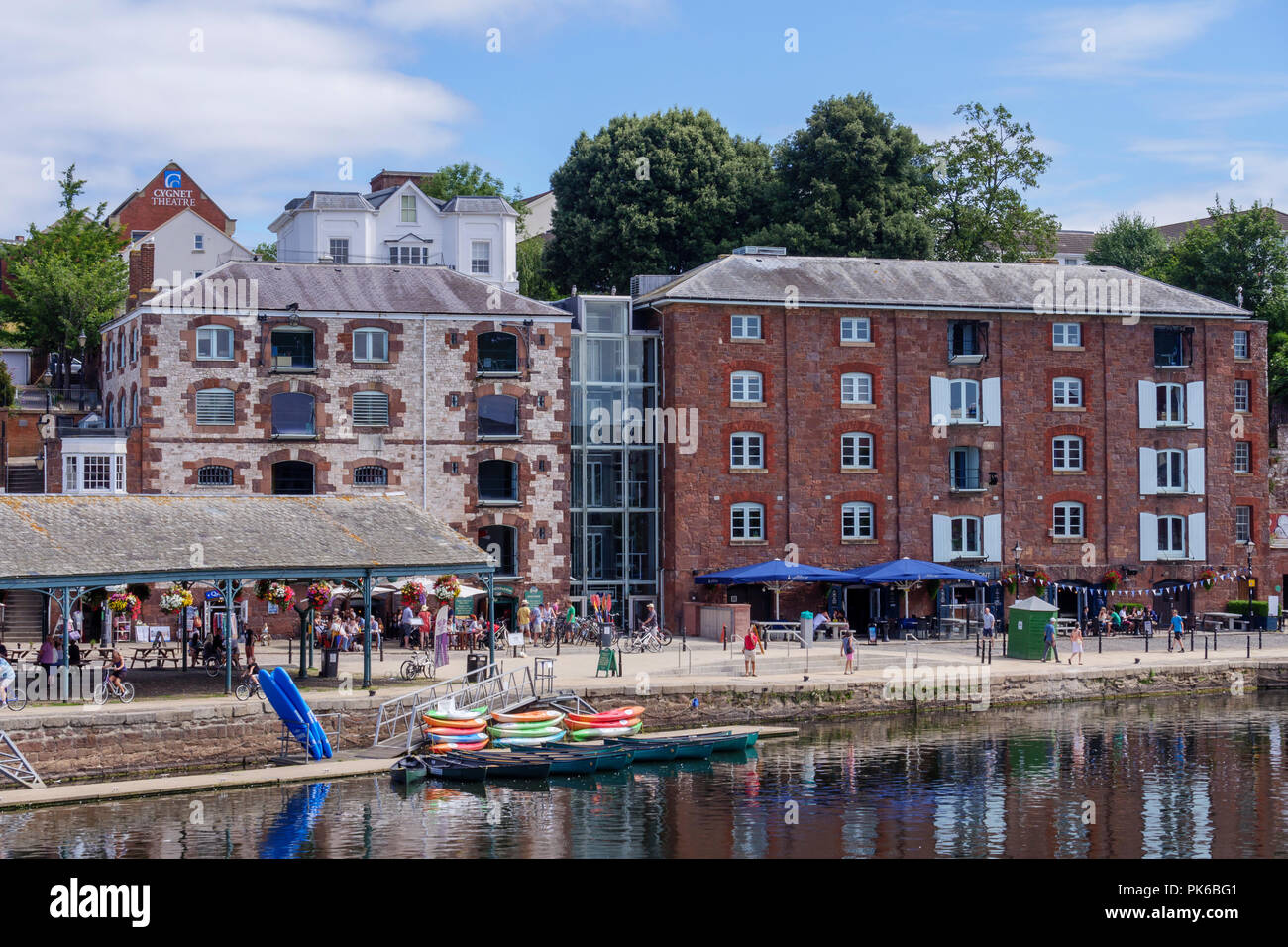 Old bonded warehouses now craft shops River Exe Exeter Quay Exeter Devon England Stock Photo