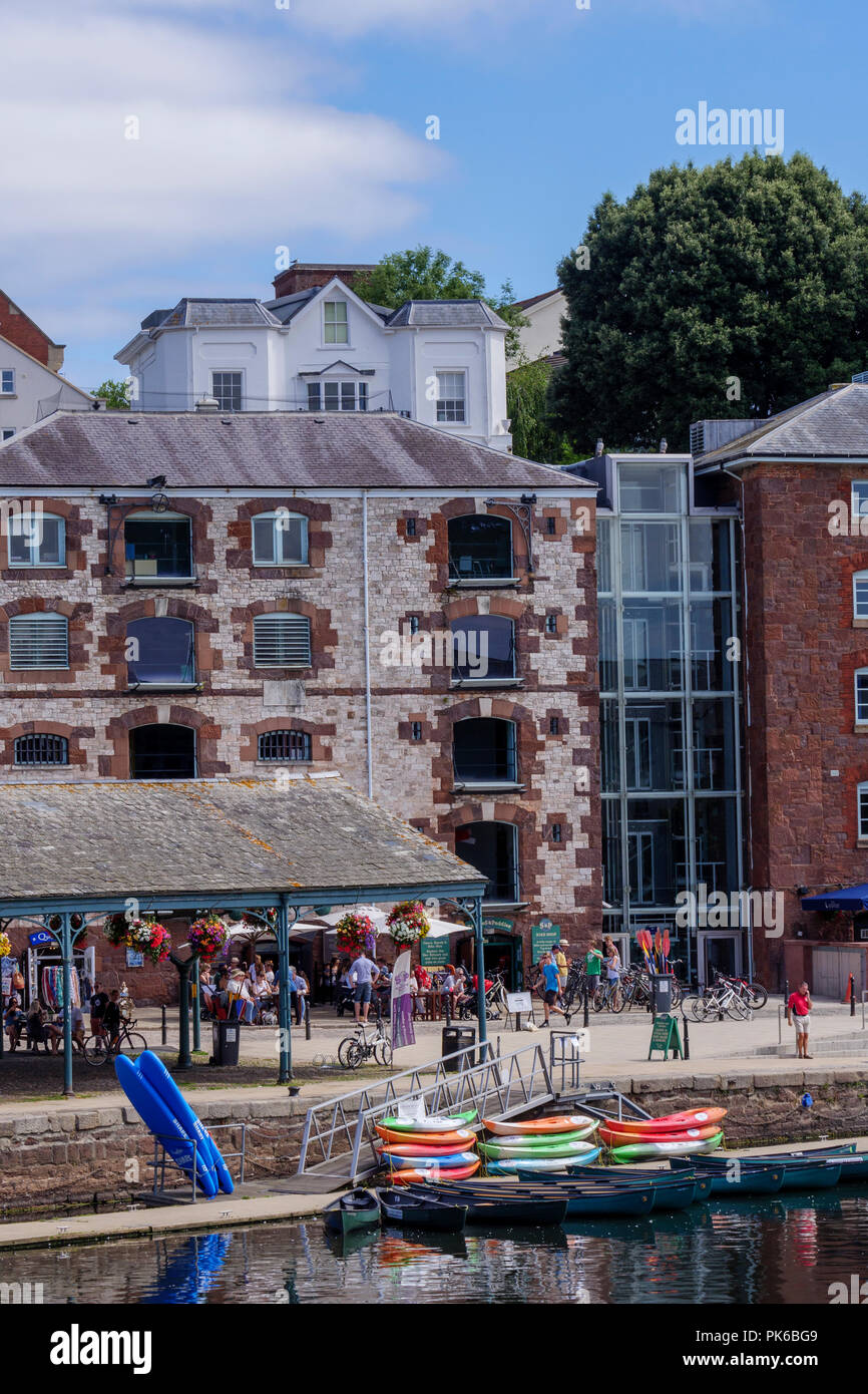 Old bonded warehouses now craft shops River Exe Exeter Quay Exeter Devon England Stock Photo