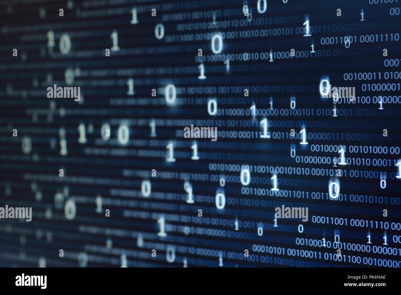 Computer display screen with binary code moving in the background. text ...