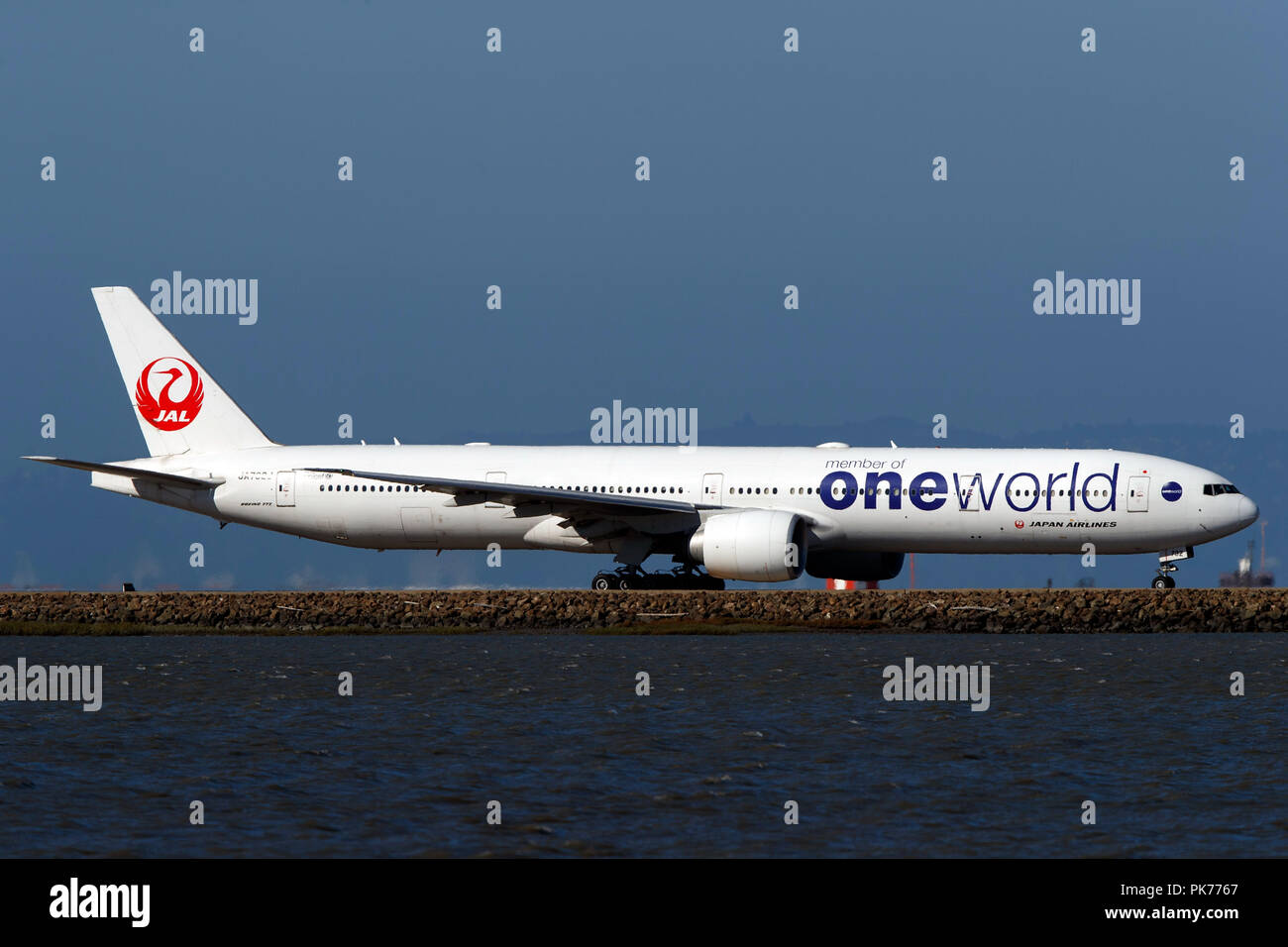 Boeing 777-346(ER) (JA732J) operated by Japan Airlines with the Oneworld livery taxiing at San Francisco International Airport (KSFO), San Francisco, California, United States of America Stock Photo