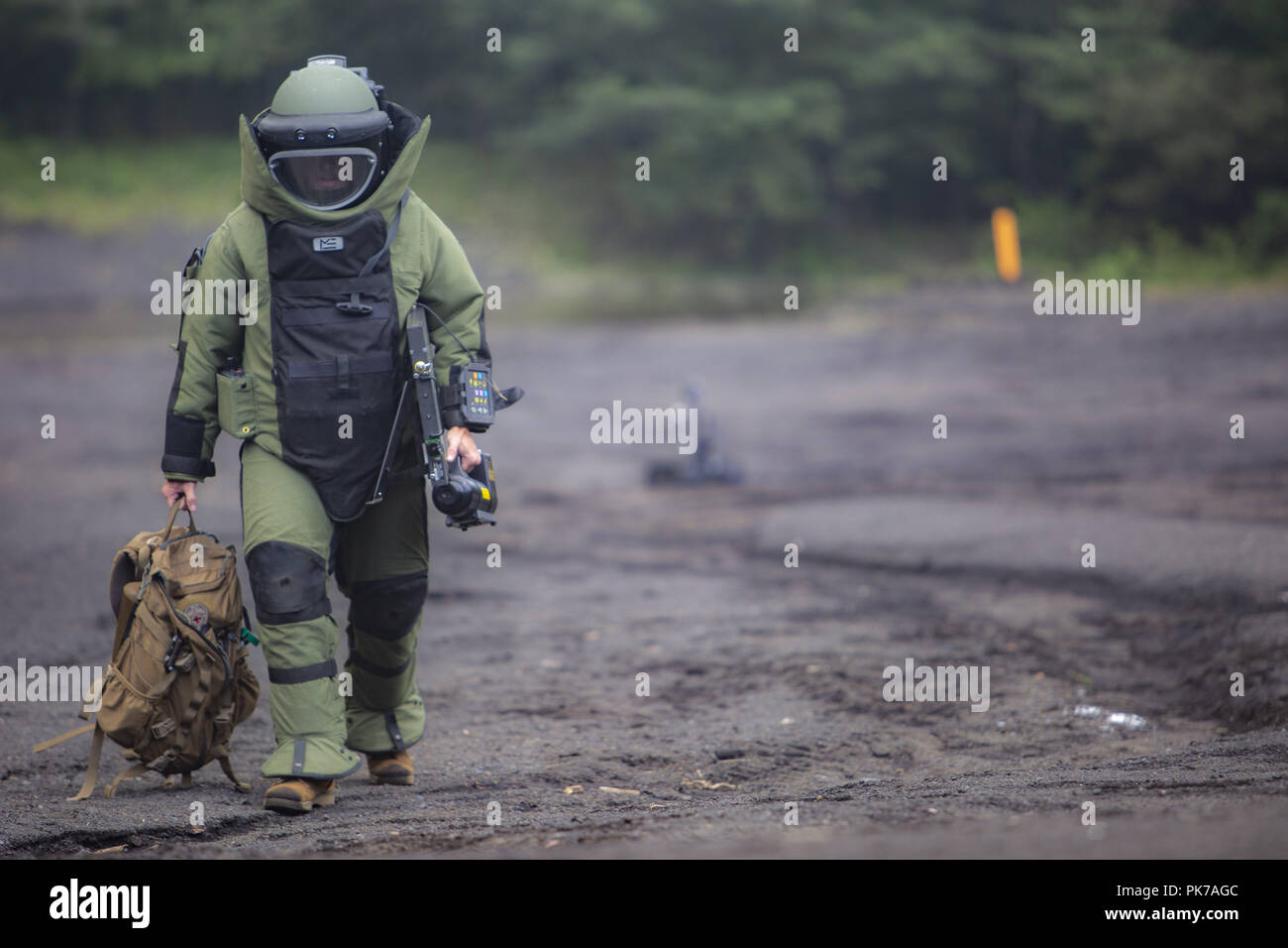 Camp Fuji, Shizuoka, Japan. 10th Sep, 2018. Sgt. Scott N. Schaller walks back from X-raying a suitcase Sept. 5, 2018 at Camp Fuji, Japan. Explosive Ordnance Disposal technicians use an X-ray to determine if they can safely inspect items. EOD Company Marines validated proficiency and prepared for worldwide mission deployment in support of III Marine Expeditionary Force by testing their ability to disable and dispose of explosives. Schaller, a native of Easton, Pennsylvania, is with EOD Company, 9th Engineer Support Battalion, 3rd Marine Logistics Group. (U.S. Marine Corps photo by Lance C Stock Photo