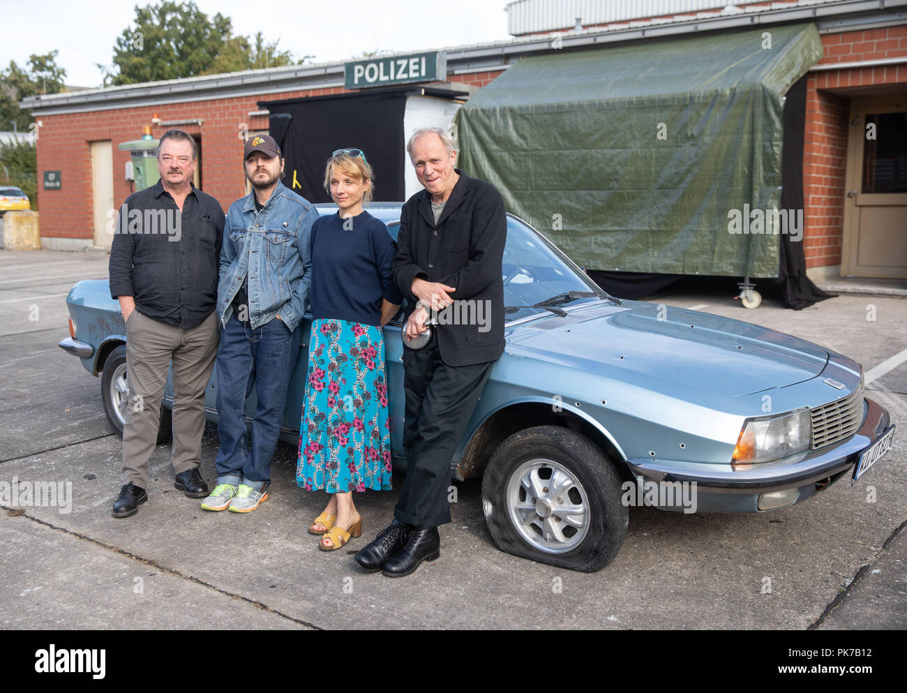 Friedberg, Hessen. 11th Sep, 2018. The actors Thomas Schmauser (l-r), Peter Kurth, Christina Große and Ulrich Tukur are on the set for a new crime scene of the Hessichen Rundfunk (HR). The eighth HR crime scene with Ulrich Tukur is created under the working title 'The Attack'. Credit: Frank Rumpenhorst/dpa/Alamy Live News Stock Photo