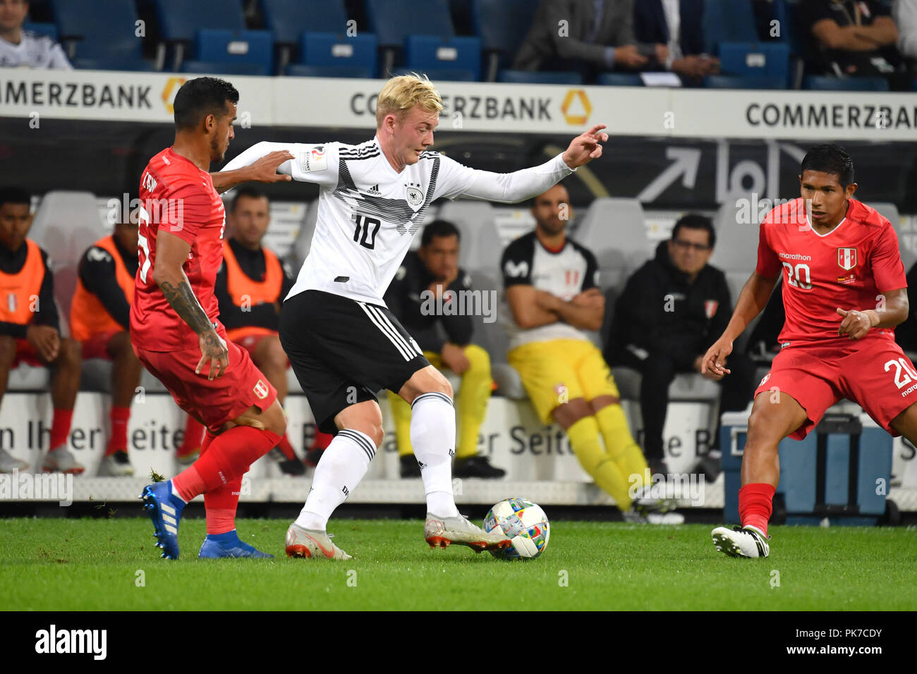 Julian BRANDT (GER), action, duels versus Miguel TRAUCO (PER), re: Edison FLORES (PER). Soccer Laenderspiel, Germany (GER) -Peru (PER) 2-1 on 09/09/2018 in Sinsheim/Wirsol Rhein-Neckar-Arena. DFB REGULATIONS PROHIBIT ANY USE OF PHOTOGRAPH AS IMAGE SEQUENCES AND/OR QUASI VIDEO. | usage worldwide Stock Photo