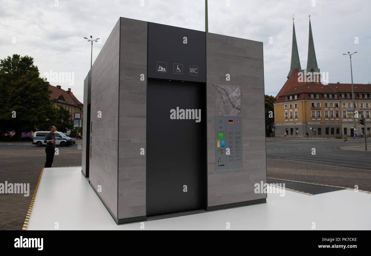 11 September 2018, Berlin: A prototype of the new city toilet is available at a press event not far from the Red Town Hall. Wall GmbH will build the new modular houses in the city from 2019. Photo: Paul Zinken/dpa Stock Photo